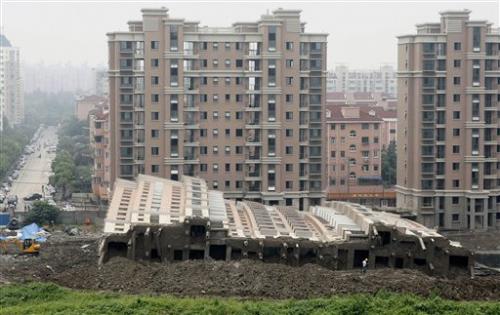 Shanghai building collapses intact @vito donatiello blog